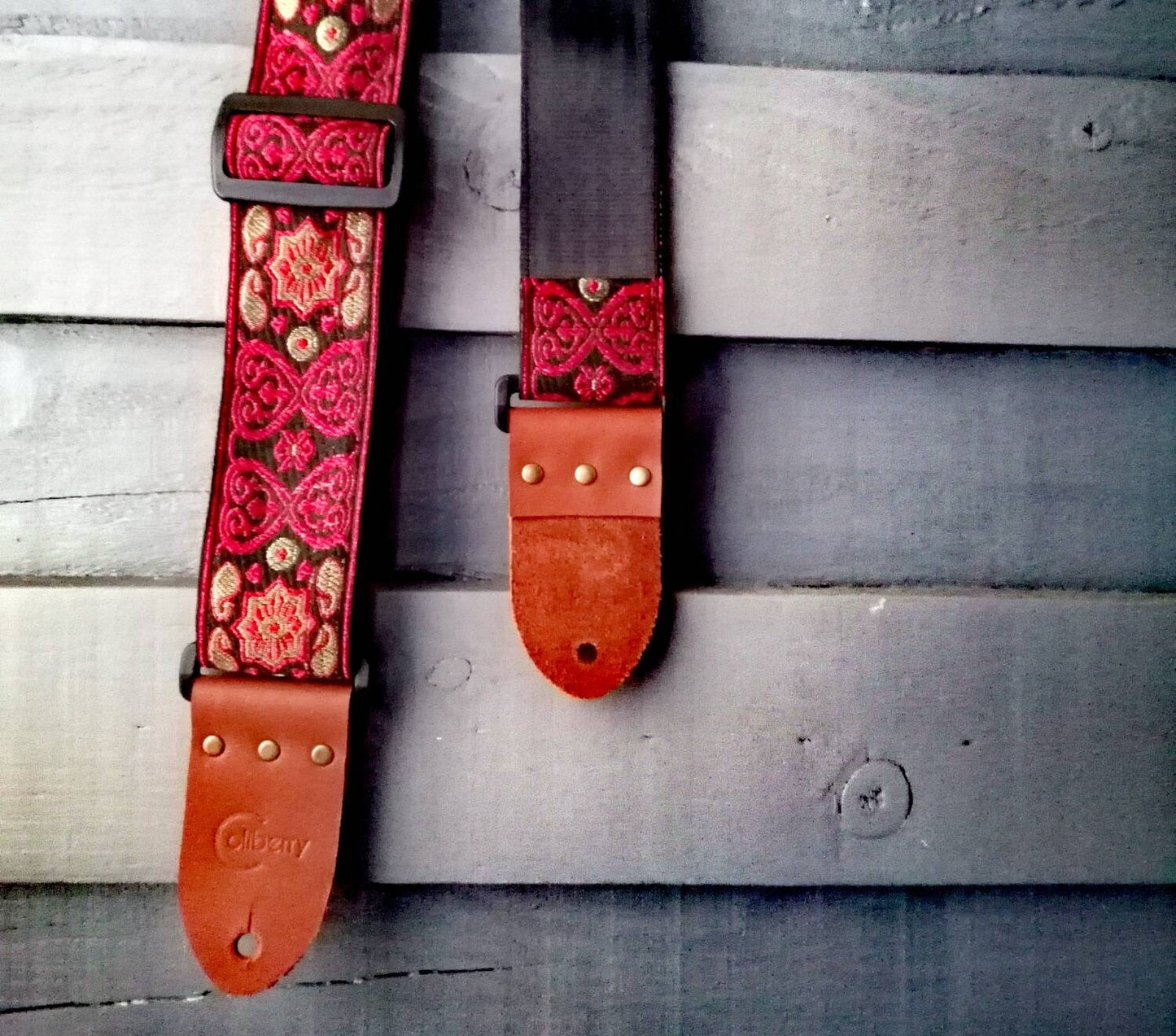 Handmade guitar straps with Baroque pattern Jaquard ribbon to the front and seatbelt backing finished with real leather ends.