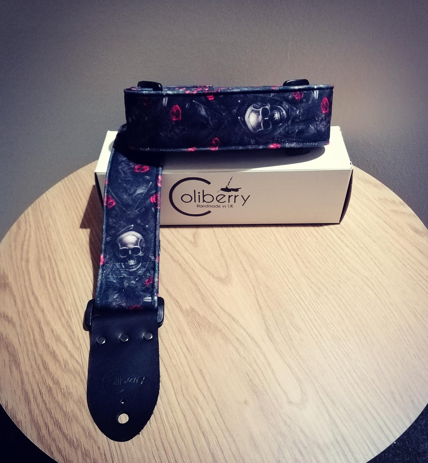 Handmade guitar strap - plush velvet with Skulls & Roses to the front, black seatbelt backing and Montana Black real leather ends.