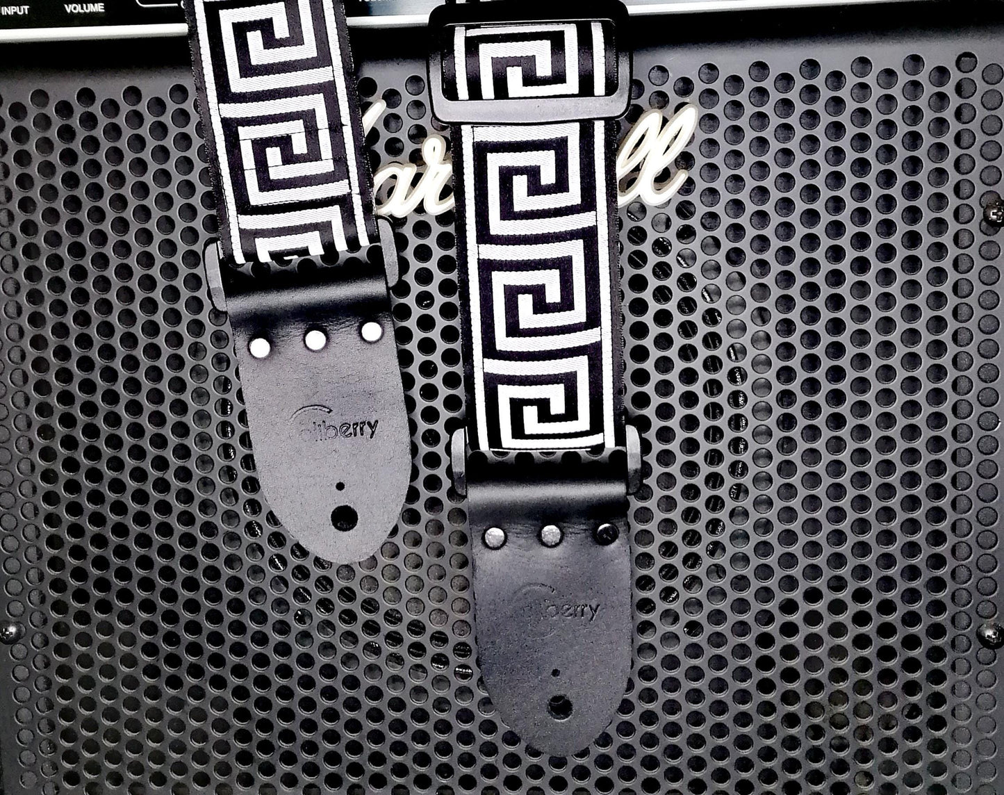 Handmade guitar strap - Greek Key Mono pattern to the front with Black Seatbelt backing and Montana Black Real Leather ends.