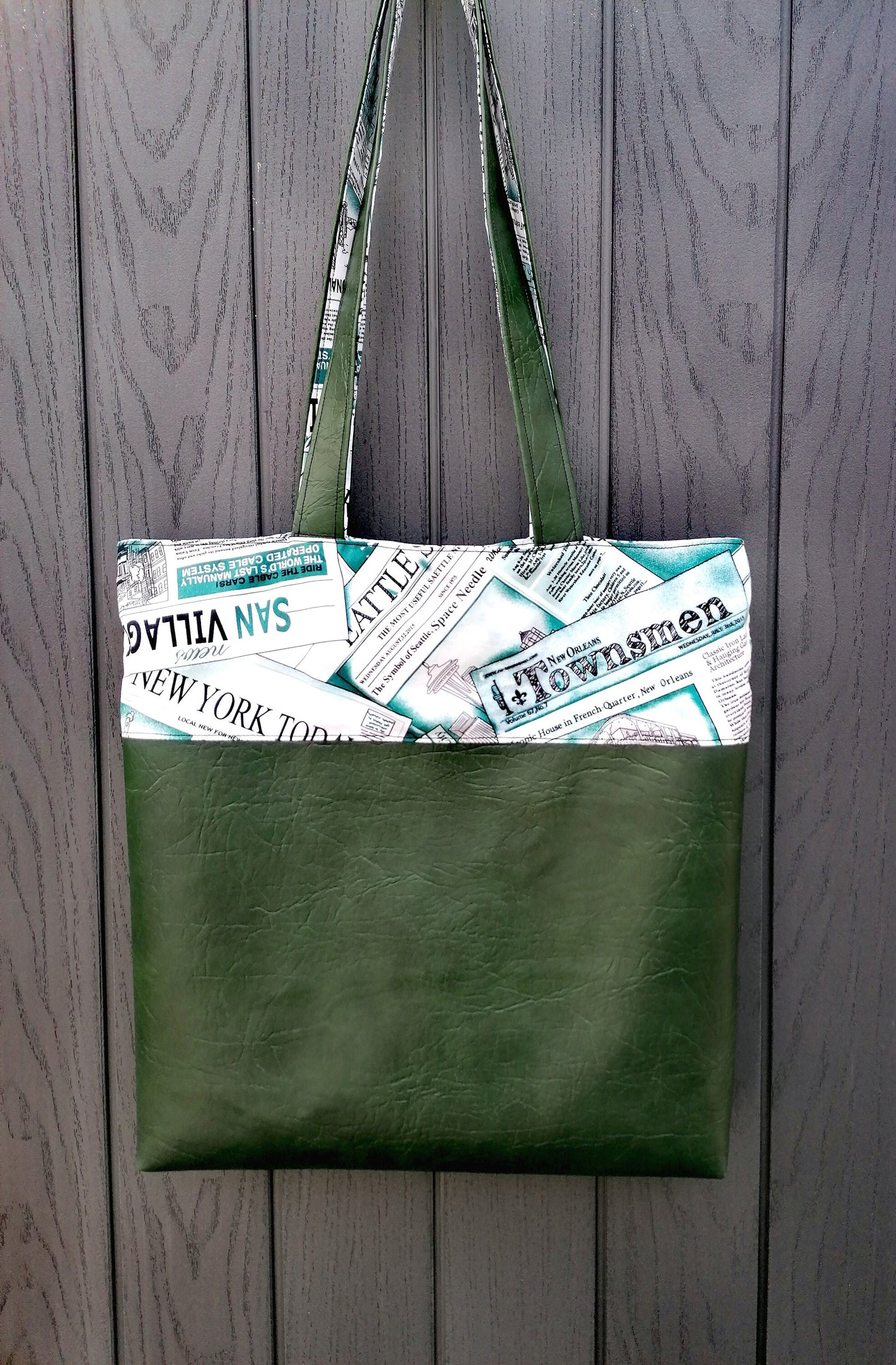Handmade Reversible Tote Bags. Available in 2 colour options. Faux Leather (Brown or Green) and Cotton poplin with Newspaper pattern.