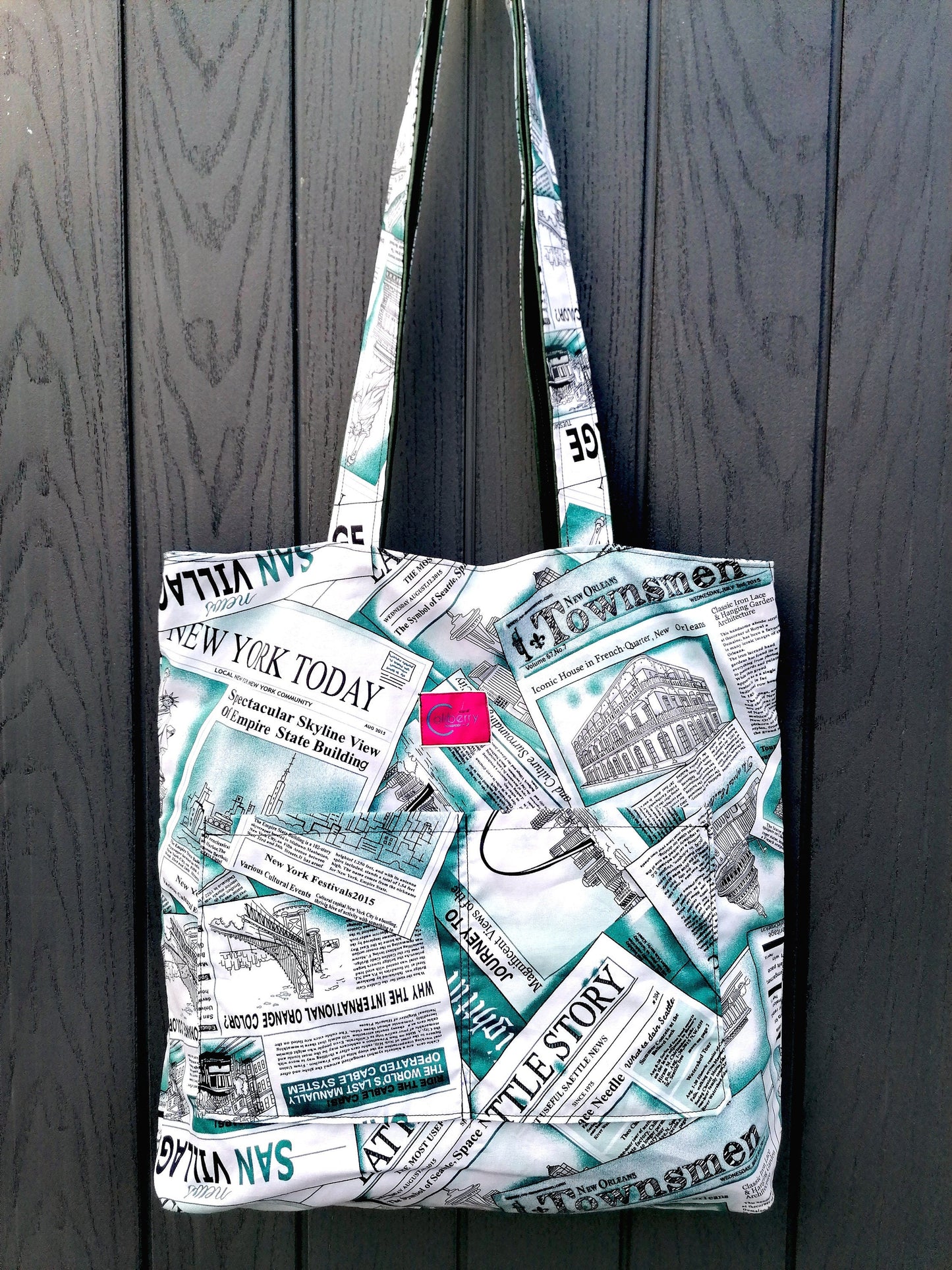 Handmade Reversible Tote Bags. Available in 2 colour options. Faux Leather (Brown or Green) and Cotton poplin with Newspaper pattern.