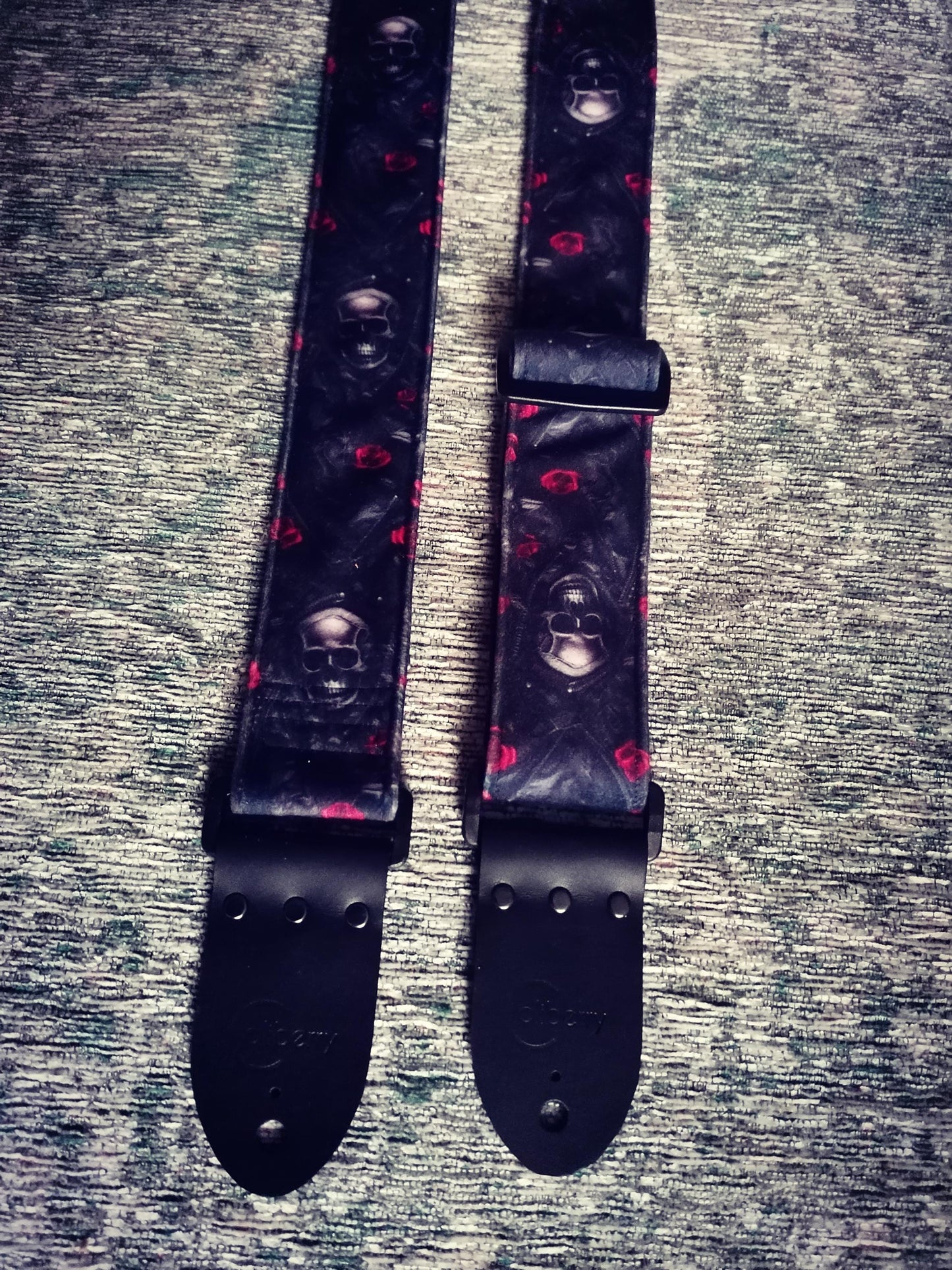 Handmade guitar strap - plush velvet with Skulls & Roses to the front, black seatbelt backing and Montana Black real leather ends.