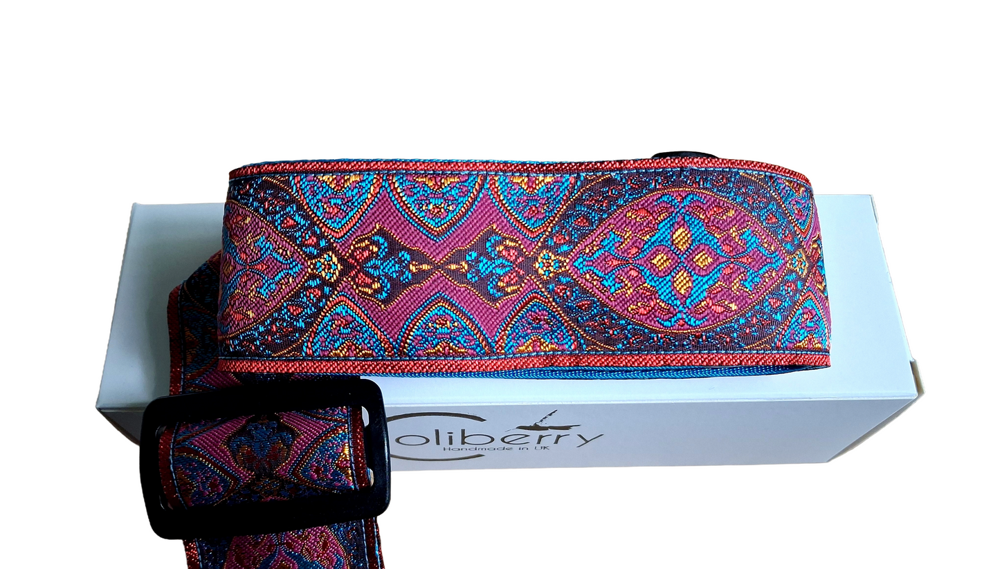 Handmade 'Pink Sunbeam' guitar strap with Kingfisher Blue real leather ends.