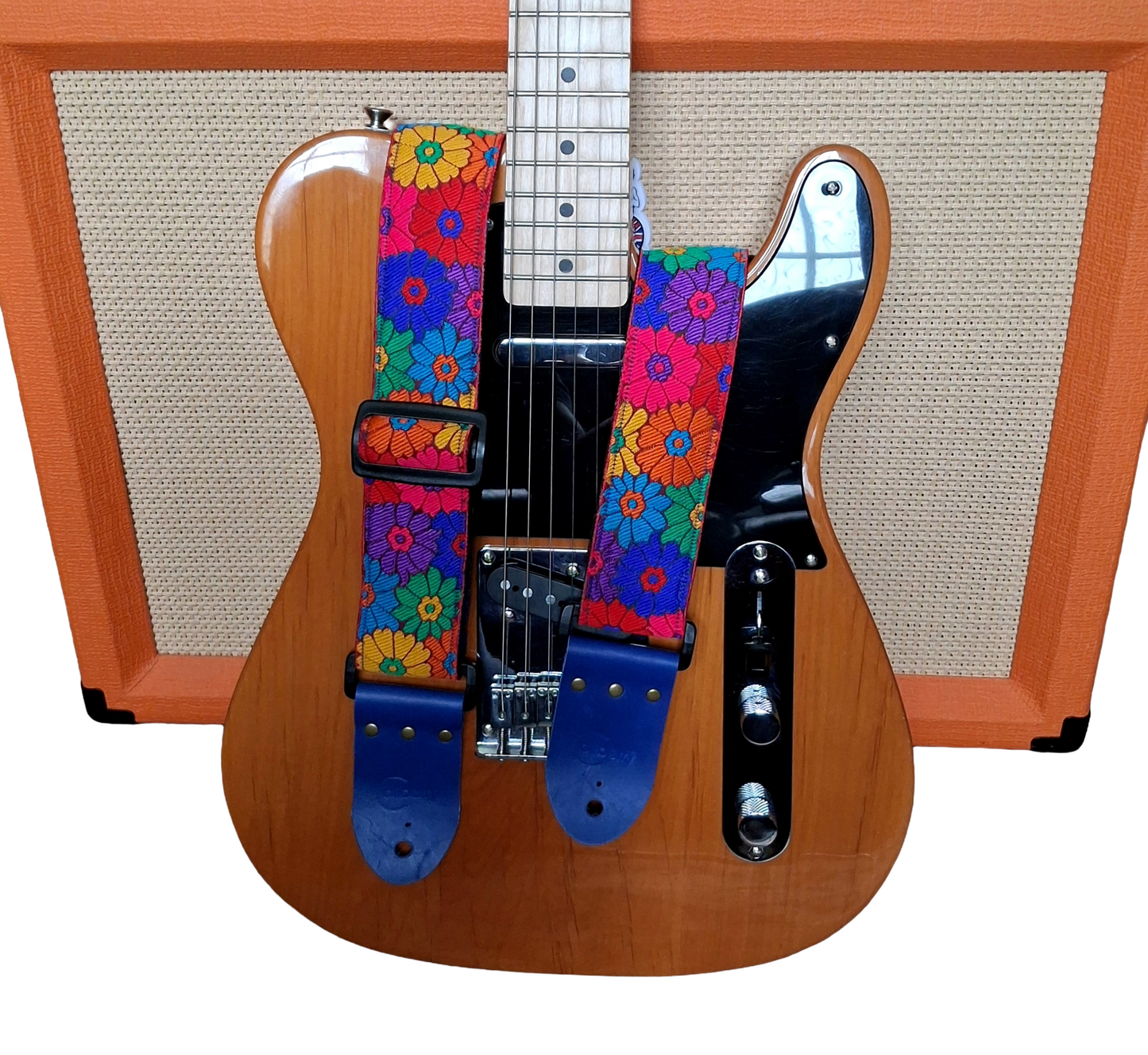 'Rainbow Meadow' Handmade Guitar Strap with blue seatbelt backing and blue real leather ends.