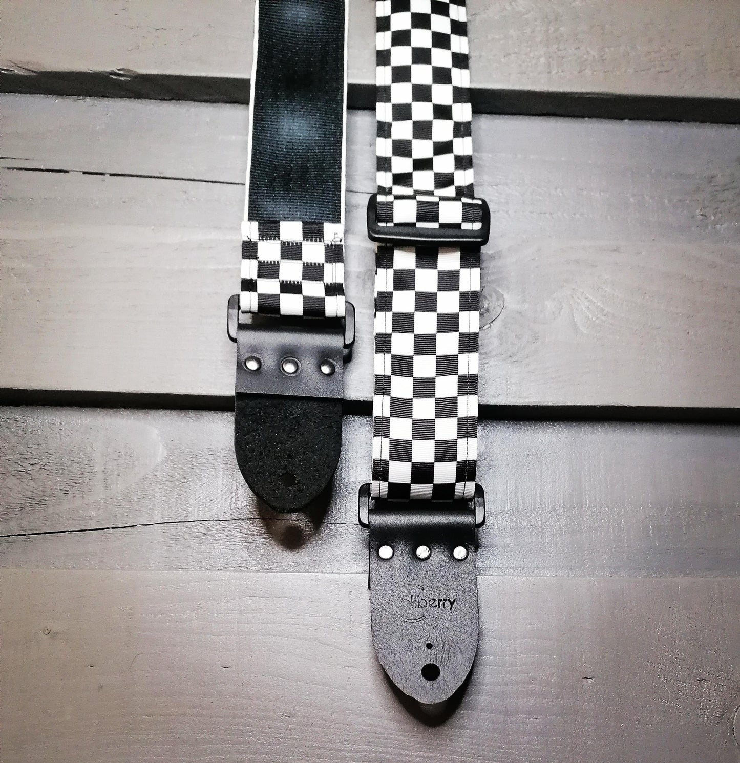Handmade guitar strap -  Black&White Chequered pattern to the front with Black Seatbelt backing and Montana Black colour Real Leather end