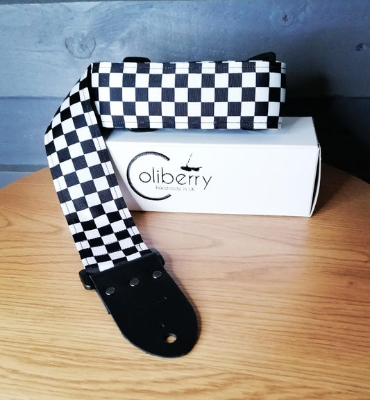Handmade guitar strap -  Black&White Chequered pattern to the front with Black Seatbelt backing and Montana Black colour Real Leather end