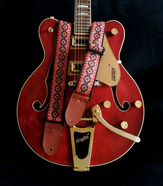 Handmade 'Rhombus' guitar strap with black seatbelt backing and Montana Hazelnut colour real leather ends.