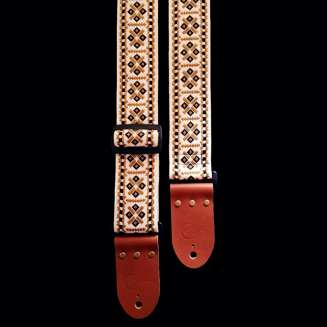 'Valkyria' handmade guitar strap in beige. Adjustable.