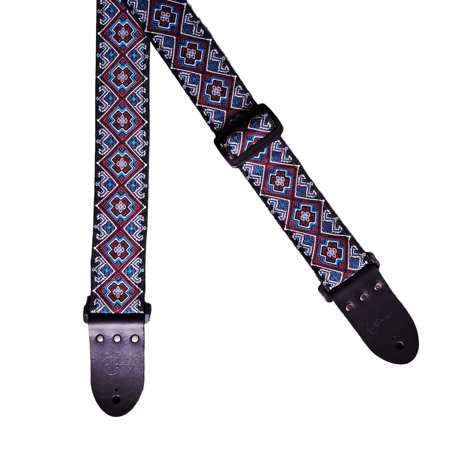 Handmade 'Cherokee' guitar strap. Jaquard Ribbon and Leather Ends. Adjustable.