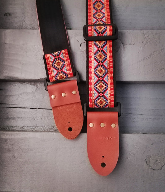 Handmade 'Rhombus' guitar strap with black seatbelt backing and Montana Hazelnut colour real leather ends.
