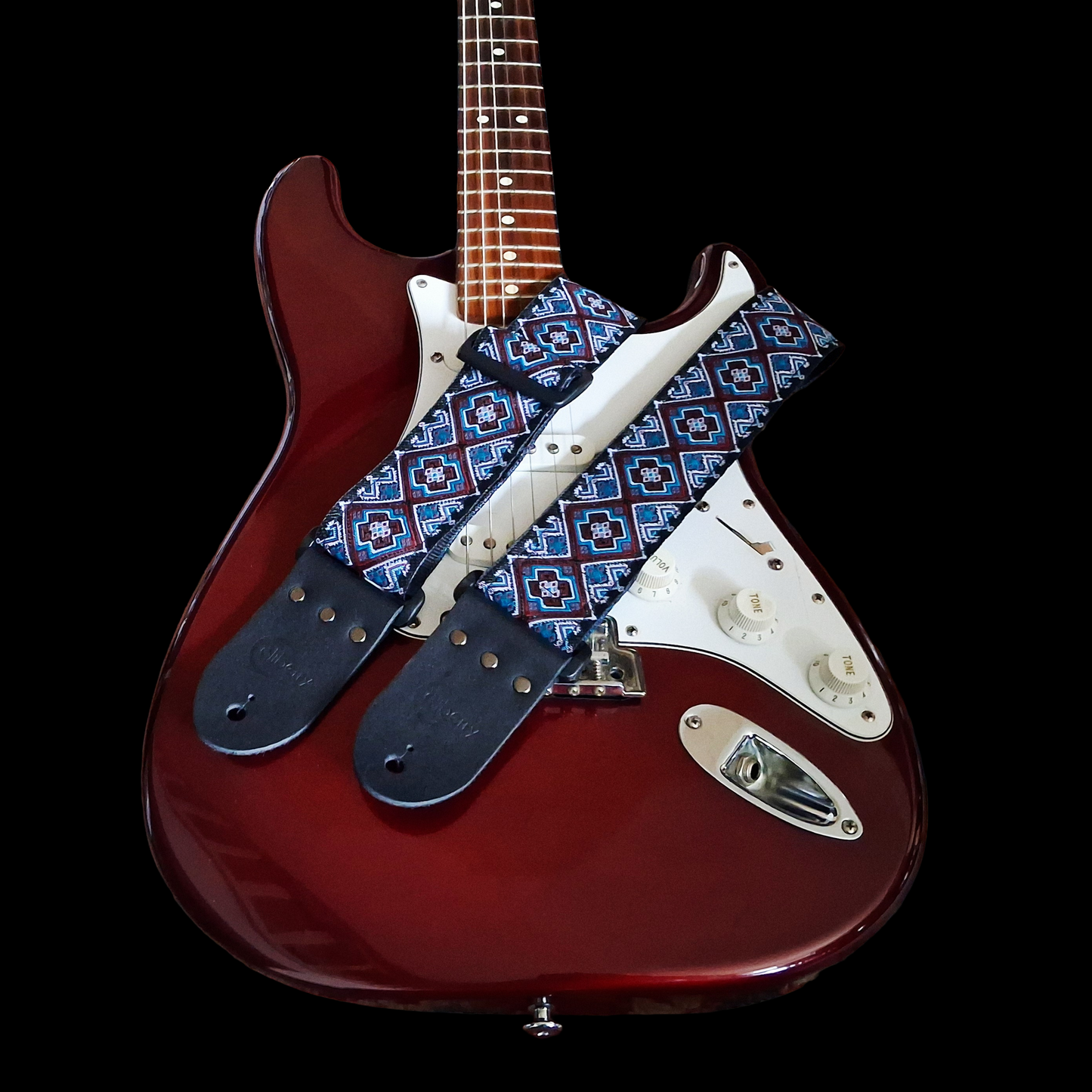 Handmade 'Cherokee' guitar strap. Jaquard Ribbon and Leather Ends. Adjustable.