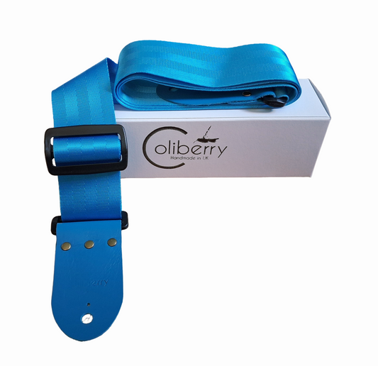 Handmade seatbelt only light blue guitar strap with kingfisher blue real leather ends.