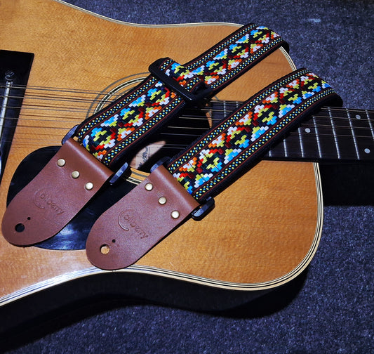 Handmade Cancun Guitar Strap: Aztec multicolour pattern Jacquard Ribbon and Leather Ends.