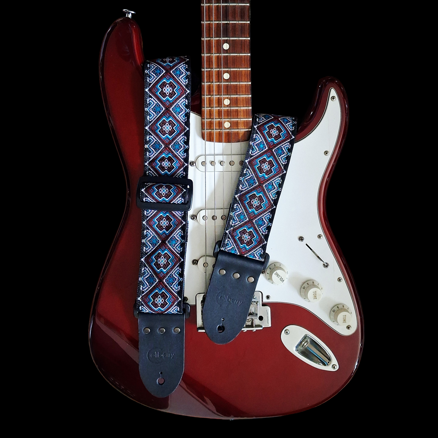 Handmade 'Cherokee' guitar strap. Jaquard Ribbon and Leather Ends. Adjustable.
