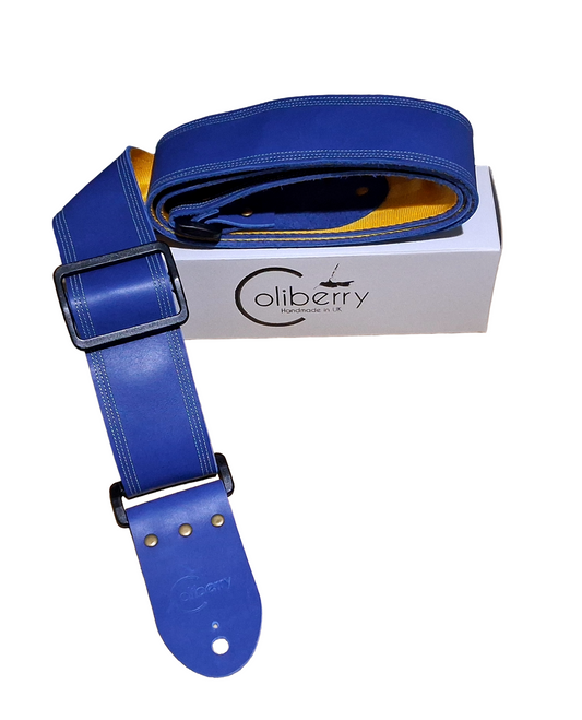 Blue Full Leather Guitar Strap with yellow seatbelt backing.