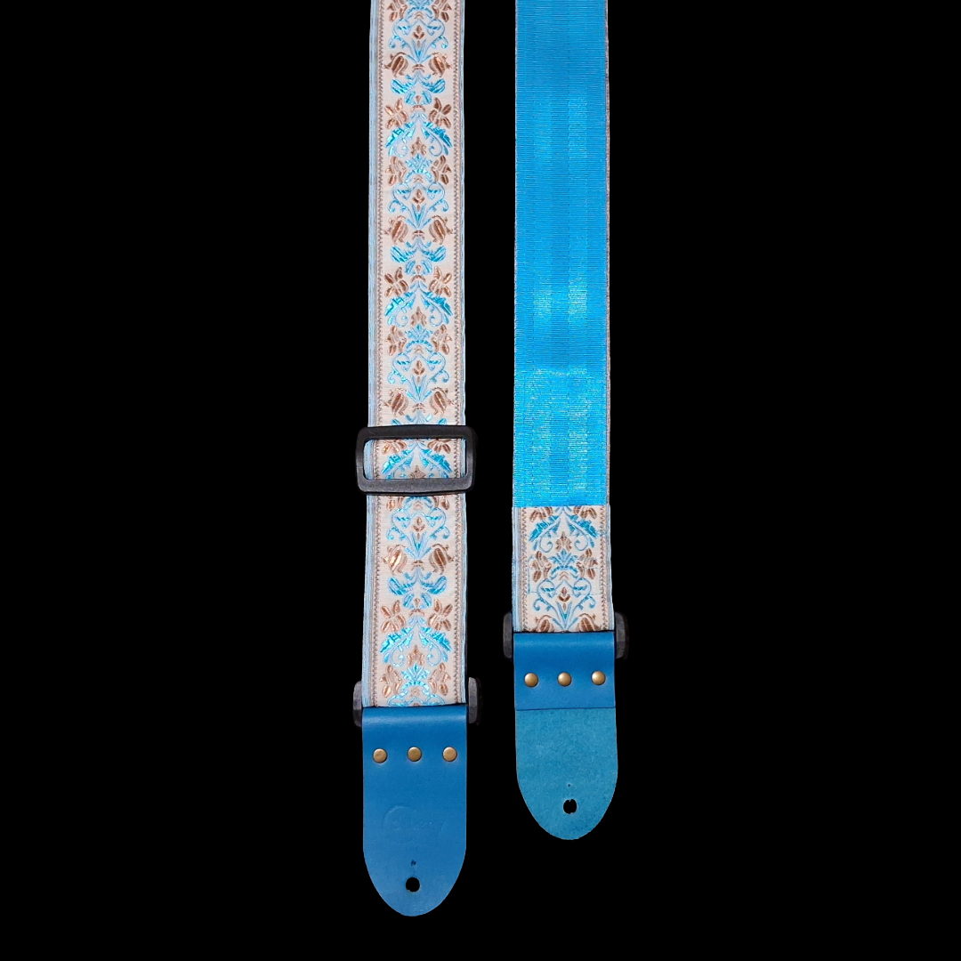 Handmade 'San Marino' guitar strap with Kingfisher Blue real leather ends. Adjustable.